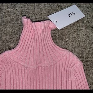 Pink turtleneck